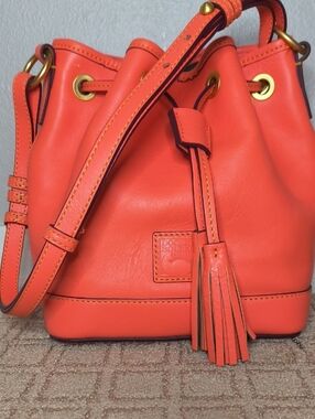 Dooney & Bourke Orange Florentine Leather Tassel Drawstring Bucket Bag